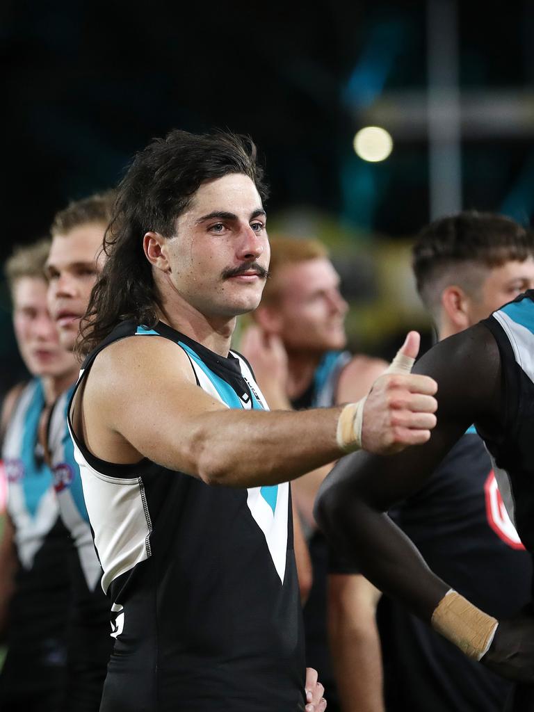 Lachlie Jones was a cult hero before he had his first touch of the Sherrin. Picture: Sarah Reed/AFL Photos/Getty Images