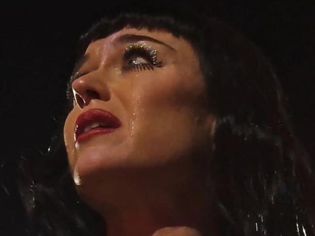 Katy Perry breaks down on stage.