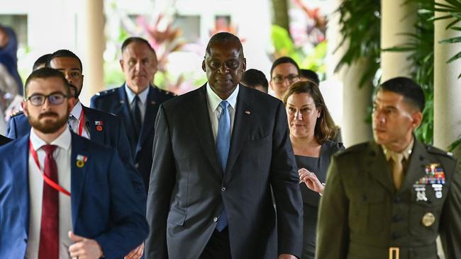 US Defence Secretary Lloyd Austin, centre, leaves a bilateral meeting with China's Defence Minister Dong Jun on the sidelines of the 21st Shangri-La Dialogue summit in Singapore. Picture: AFP