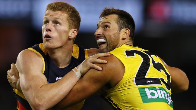 Adelaide’s Reilly O'Brien battles Richmond’s Toby Nankervis. Picture: Michael Klein