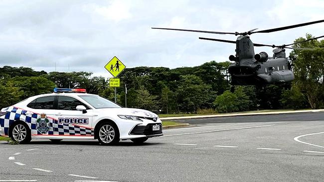 A Singapore air force CH-47F Chinook Helicopter landing outside Ingham State High School on Sunday. The floods in Hinchinbrook Shire, North Queensland. Picture: Cameron Bates