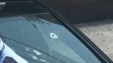 NSW Police said three vehicles were hit with bullets and a nearby building was also damaged in the shooting. Picture: 9News