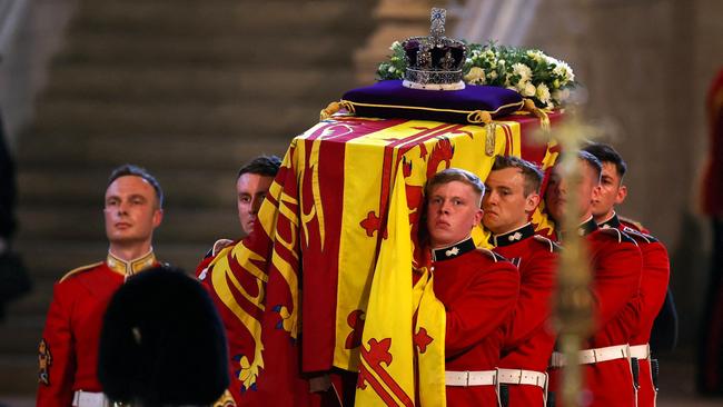 Pallbearers carry the coffin of Queen Elizabeth into Westminster Hall to lie in state. Picture: AFP