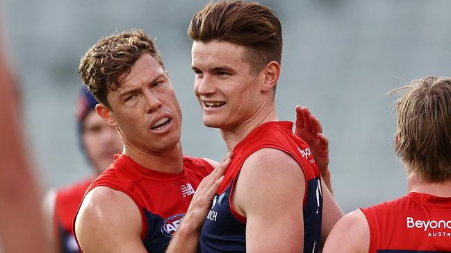 Bayley Fritsch of the Demons is congratulated by Jake Melksham after a last quarter goal. Picture: Michael Klein