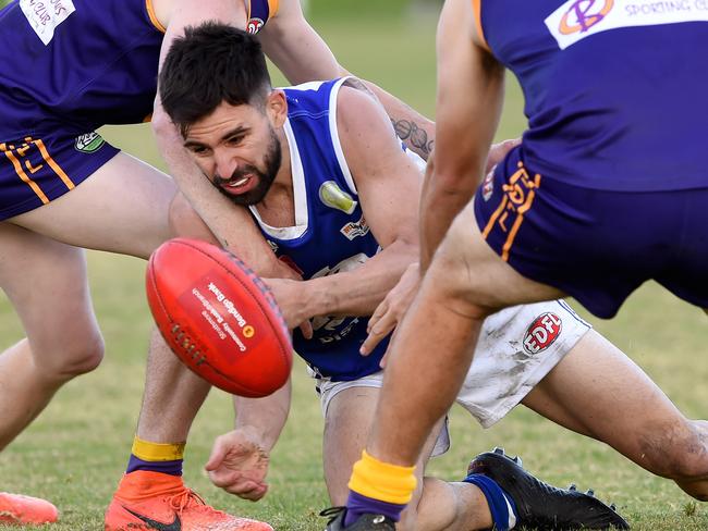 EDFL Football: Jacana v Coburg Districts at Jacana Reserve. George Pilipasidis under pressure from Thomas Butler and Nathan Walker. Picture: Steve Tanner