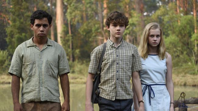 Jasper Jones (Aaron McGrath), Charlie Bucktin (Levi Miller) and Eliza Wishart (Angourie Rice) in a scene from the film Jasper Jones.