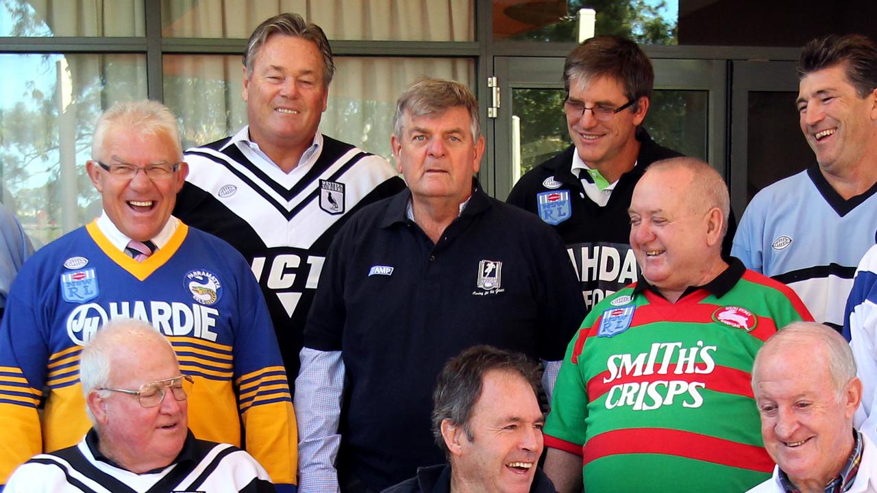 Barry Ross (centre) with rugby league greats at a Men of League Foundation visit, has died.