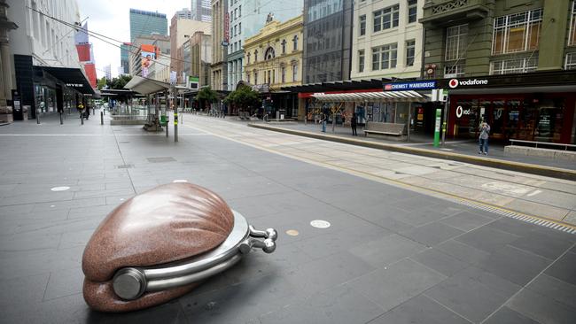 Luring shoppers back to famed strips such as Melbourne’s Bourke Street Mall will require ideas such as free public transport and parking. Picture: Andrew Henshaw