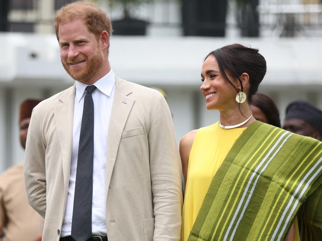 Harry and Meghan in Nigeria. Picture: Kola Sulaimon/AFP