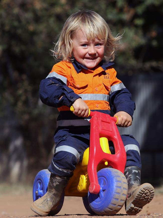 Darcy Josephs goes out with his grandpa every day to feed the sheep. Picture: Gary Ramage