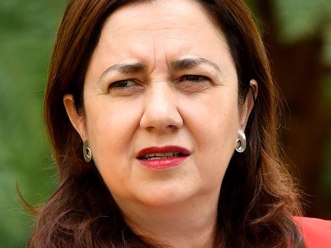 Queensland Premier Annastacia Palaszczuk is seen during a press conference at Queensland Parliament House in Brisbane, Tuesday, March 31, 2020. Premier Palaszczuk announced that Queensland had 55 more cases of coronavirus (COVID-19), taking the state's overall number to 743 cases. (AAP Image/Darren England) NO ARCHIVING