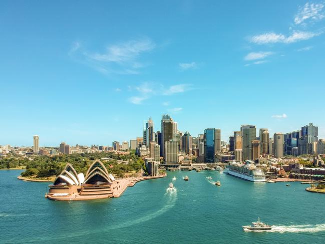 Stunning wide angle aerial drone view of the Sydney Harbour with the Opera House, a cruise ship and many skyscrapers in the background. Taken near the suburb of Kirribilli. New South Wales, Australia. Picture: iStockPre-cruise stay tips, Sarah Nicholson, Escape