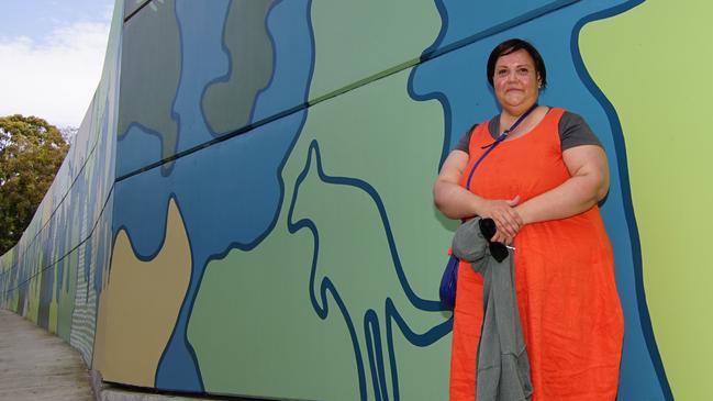 Cromer artist Jessica Birk at an event marking the official completion of an Aboriginal mural — Shorelines and Storylines — alongside the Burnt Bridge Creek Deviation at North Balgowlah. Picture: RMS