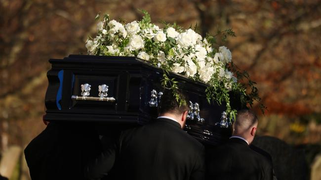 Pall bearers carried the coffin into the funeral. Picture: Dan Kitwood/Getty Images