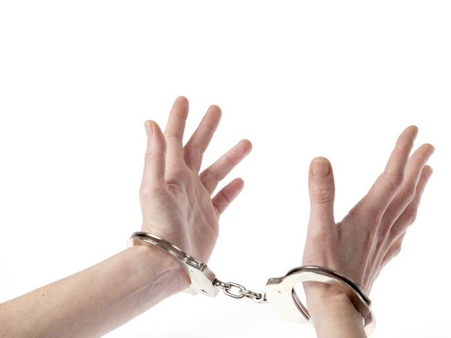 Hands in handcuffs