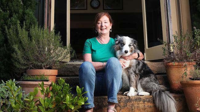 Theresa Doherty with dog Aiofe. Theresa is a property owner in Mount Stuart, a suburb in Hobart that is performing very well with property sales. Picture: Nikki Davis-Jones.