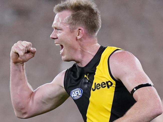 Jack Riewoldt of the Tigers celebrates a goal during the Round 1 AFL match between Richmond and Carlton at the MCG in Melbourne, Thursday, March 19, 2020. (AAP Image/Michael Dodge) NO ARCHIVING, EDITORIAL USE ONLY