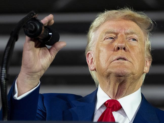 President Donald Trump speaks on his first 100 days at Macomb County Community College Sports Expo Centre in Warren, Michigan. Picture: AP