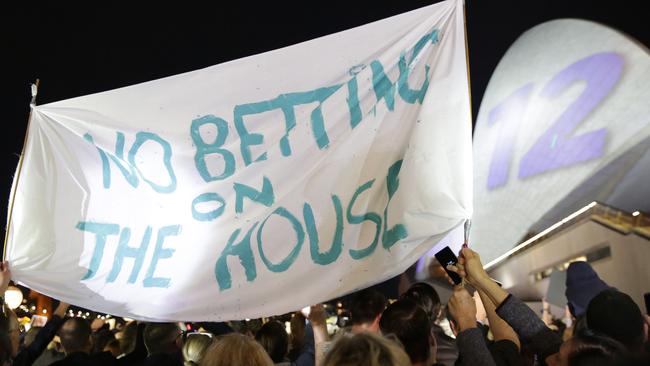 Pictured outside the Sydney Opera House are protesters. Picture: Christian Gilles