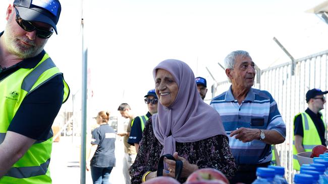 Australian nationals were met by DFAT staff bearing fruit and water at Larnaca International Airport in Cyprus. Picture: AFP