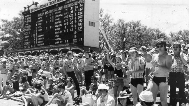 Fans on the hill in front of the iconic Adelaide scoreboard during the 1981 Test between Australia and India at the Adelaide Oval.