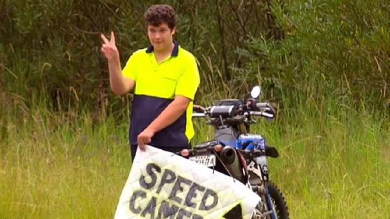 Beau Jackson has taken to standing by the side of roads north of Sydney warning drivers about hidden mobile speed cameras. Picture: A Current Affair