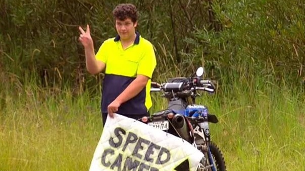 Beau Jackson has taken to standing by the side of roads north of Sydney warning drivers about hidden mobile speed cameras. Picture: A Current Affair