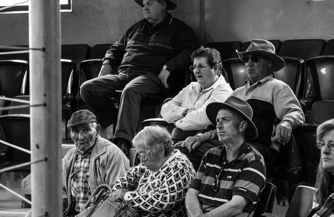 A group of people watching the livestock auction. Picture: Edwin Lim