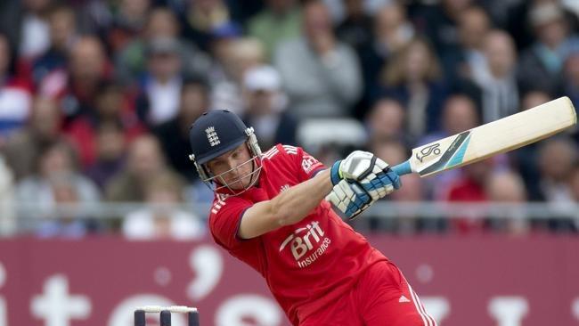 England's wicketkeeper Jos Buttler swings at the ball against New Zealand at Trent Bridge. Picture: Matt Dunham for AP.