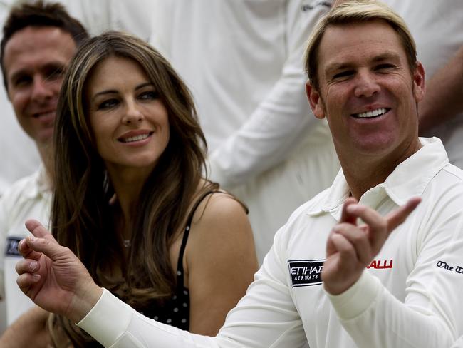 Shane Warne and his partner, model Elizabeth Hurley, in 2013. Picture: Getty