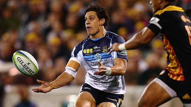 CANBERRA, AUSTRALIA - APRIL 25: Matt Toomua of the Brumbies passes during the round 11 Super Rugby match between the Brumbies and the Chiefs at Canberra Stadium on April 25, 2014 in Canberra, Australia. (Photo by Mark Nolan/Getty Images)