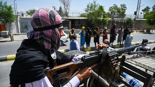 A Taliban fighter mans a machinegun as they patrol a street in Kabul. Picture: AFP