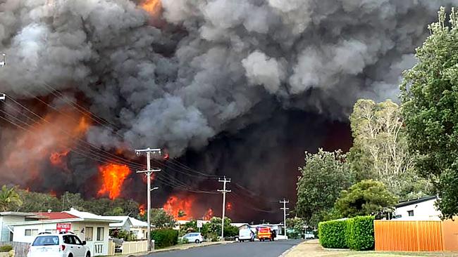 This picture taken on November 8, 2019 shows flames from an out of control bushfire seen from a nearby residential area in Harrington, some 335 kilometers northeast of Sydney. Picture: AFP Photo/Kelly-Ann Oosterbeek