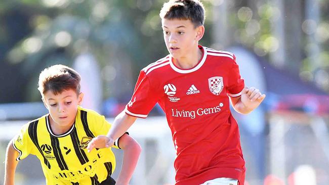 SOCCER: Junior football carnival, Maroochydore. Gold Coast Knights (red) V  Morton Bay United, boys. Picture: Patrick Woods.