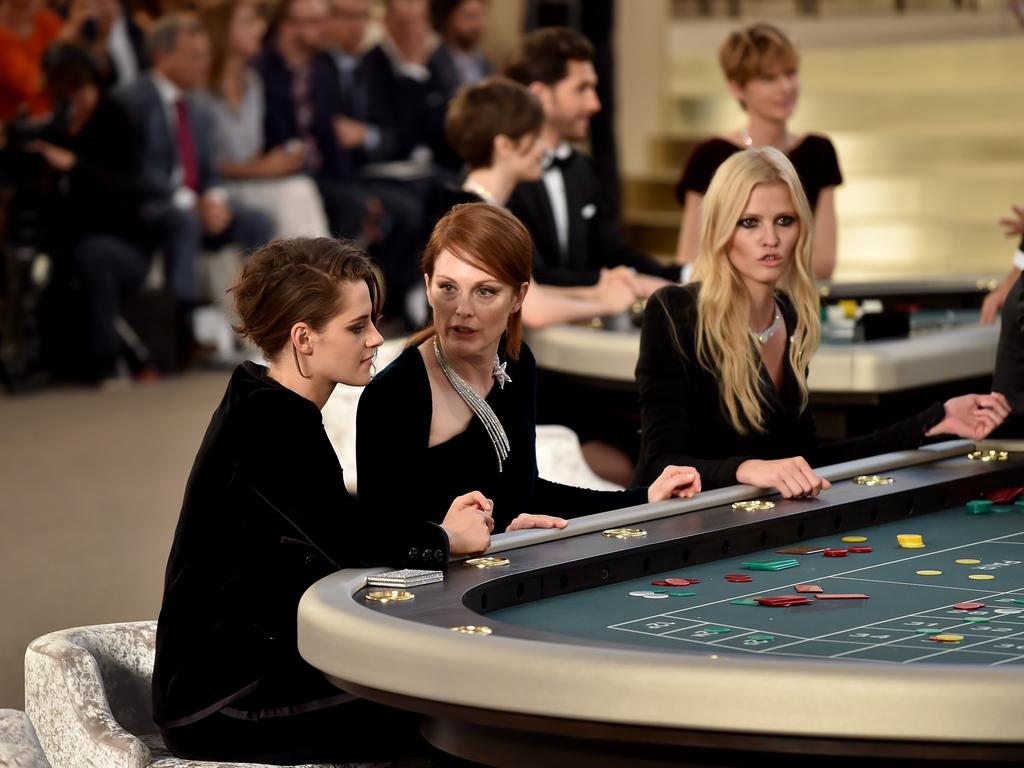 Kristen Stewart, Julianne Moore and Lara Stone attend the Chanel show as part of Paris Fashion Week Haute Couture Fall/Winter 2015/2016. Picture: Getty