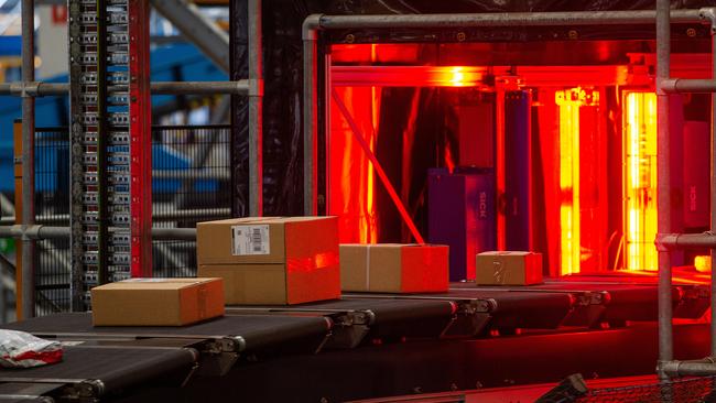 Australia Post’s Melbourne parcel facility in full swing. Picture: Mark Stewart