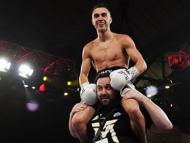 Twin brother Jason Moloney celebrates his win against Dixon Flores.