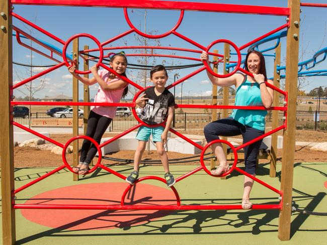 Pictured are The Gables’ future residents Nicole Surma and her children Bailley, 7, and Koby, 6, enjoying the new park. Picture: Celestino