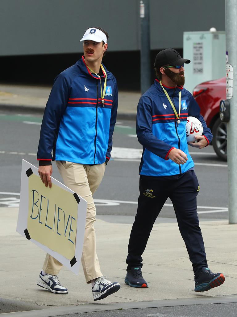 Shanon Neal and Mitch Hardie arriving for the Cats Mad Monday. Picture: Alison Wynd