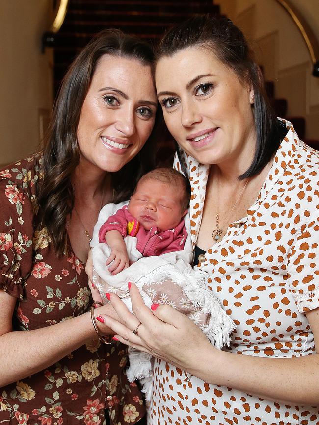 Sisters and lead petitioners, Jacqui and Natalie Gray and Natalie's 4 day old daughter Tilly as the Voluntary Assisted Dying Bill was passed by the Legislative council. Picture: Zak Simmonds