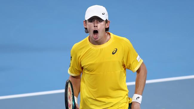 SYDNEY, AUSTRALIA - DECEMBER 28: Alex de Minaur of Team Australia celebrates a point in his Group F singles match against Tomas Martin Etcheverry of Team Argentina during day two of the 2025 United Cup at Ken Rosewall Arena on December 28, 2024 in Sydney, Australia. (Photo by Jason McCawley/Getty Images)