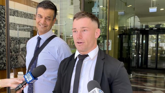 NRL gun Tom Starling (right) with his lawyer Samar Singh-Panwar outside Downing Local Court on February 10, 2023, after a charge of hindering police was dropped. Picture: Alexi Demetriadi