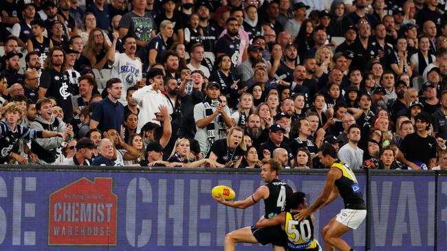 Fans react during the 2022 opening round match Carlton and Richmond at the MCG in March. (Photo by Dylan Burns/AFL Photos via Getty Images)