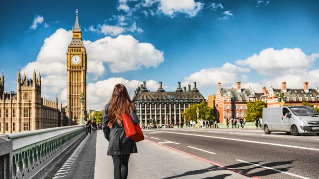 London city urban lifestyle tourist woman walking. Businesswoman commuting going to work on Westminster bridge street early morning. Europe travel destination, England, Great Britain, UK.Escape 16 June 2024Why I travelPhoto - iStock