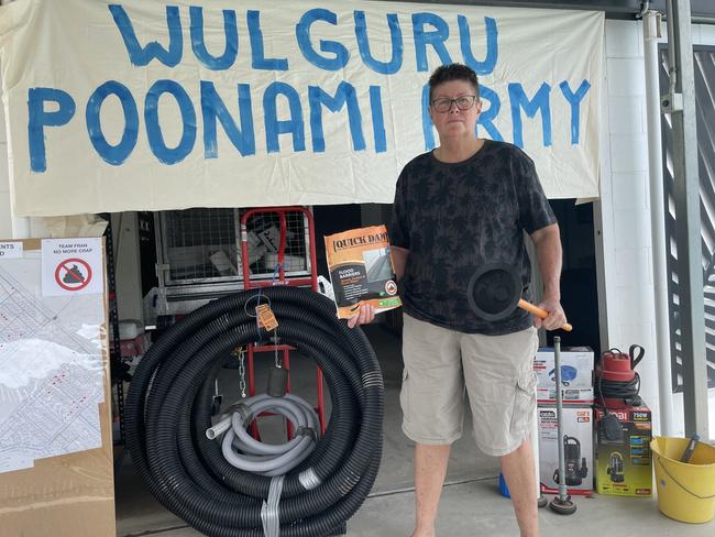 Poonami Army leader Leanne Dobbin has an array of equipment to deal with sewage flooding at her property. Picture: Leighton Smith.