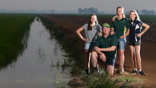 Peter and Renee Burke with their twin daughters Sienna and Jasmine. Picture: Yuri Kouzmin