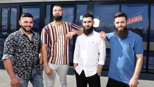 Ozzie Cevik, Belal Hamied, Esad-Naci Erol and Yunus-Emre Erol outside their new store Big Buns. Picture: Peter Wallis