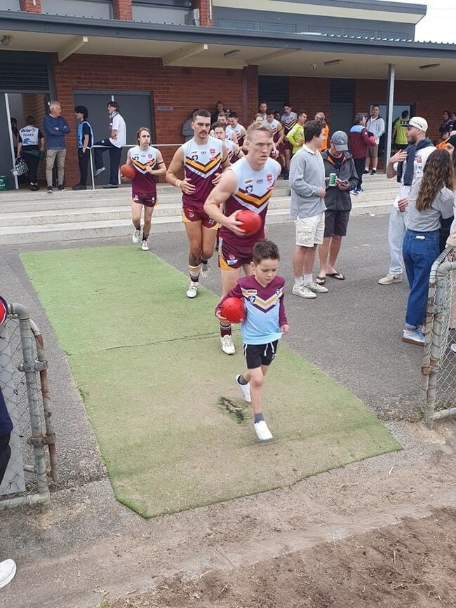 Hunter running out with Newcomb's senior side. Picture: Supplied