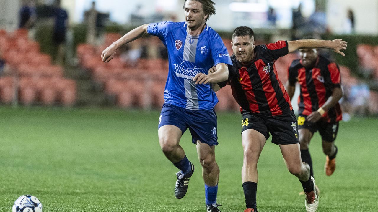 Jase Sampson (left) of Rockville Rovers and Jackson Bell of Gatton Redbacks in FQPL3 Darling Downs men grand final at Clive Berghofer Stadium, Saturday, August 31, 2024. Picture: Kevin Farmer