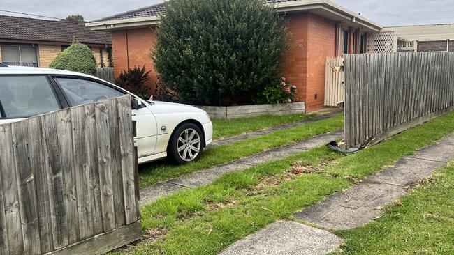 The man drove through nearby fences, leaving behind debris of wood across the lawns. Picture: Jack Colantuono